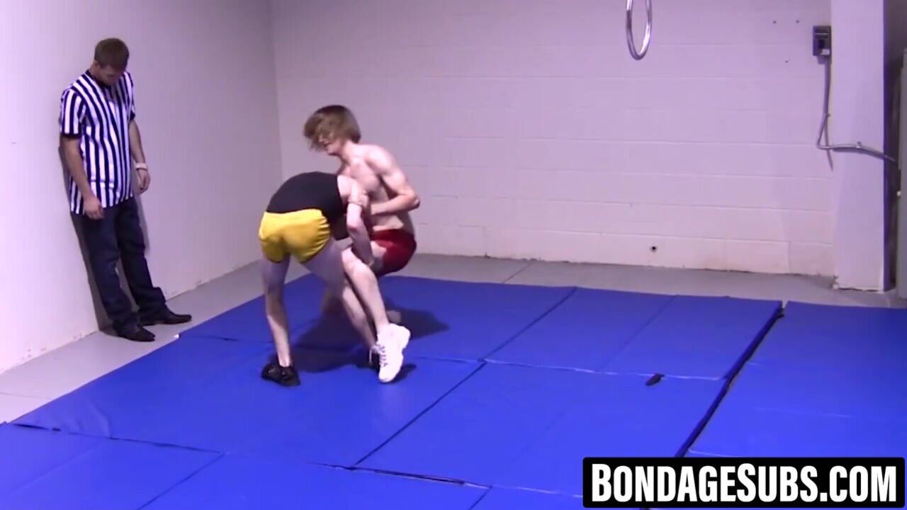 Slim boys wrestle roughly before shedding clothes