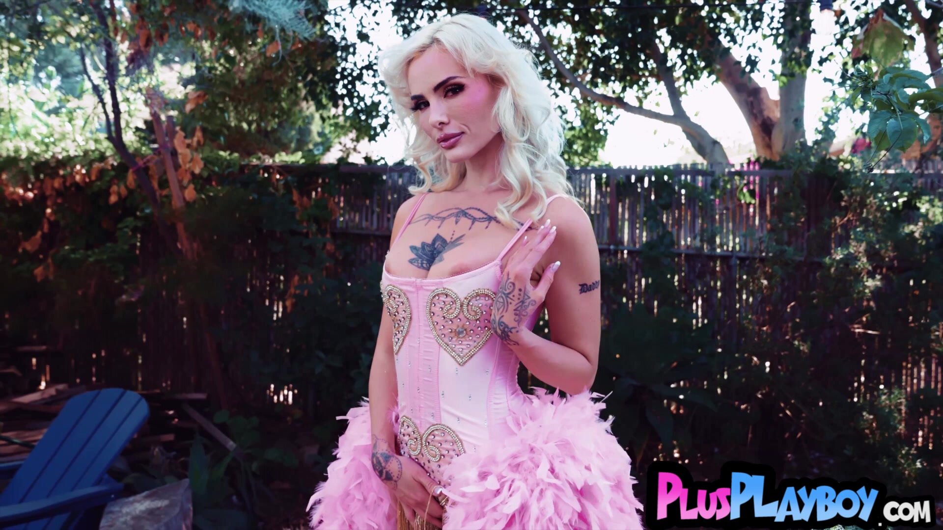 Big ass inked babe exposing amazing body while posing in sexy lingerie