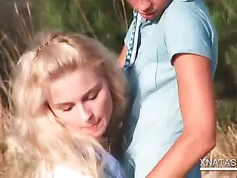 Outdoor lesbian scene with Natasha Shy rubbing pussy